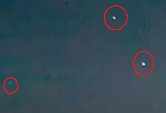 Nine UFOs in a triangular formation fly over Ipswich UK