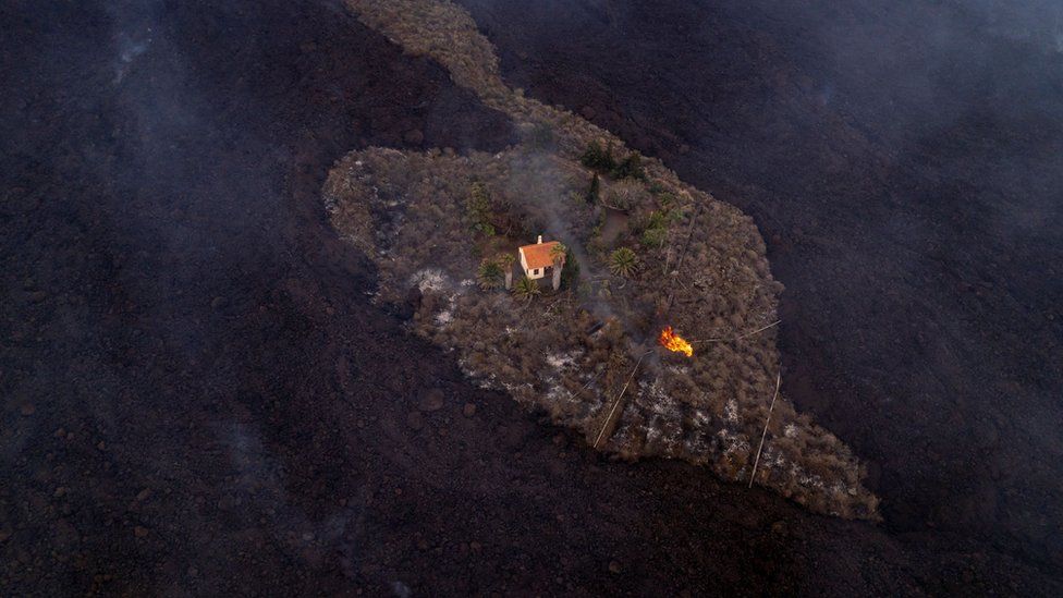 Miracle House volcanic lava bypassed the villa of retirees in the Canary Islands