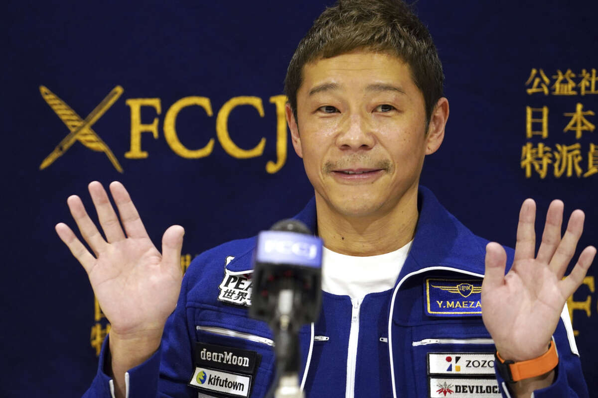 Japanese billionaire Maezawa returns from space with new business ideas