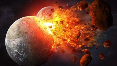 Structures near Earths core may be the result of interplanetary collision