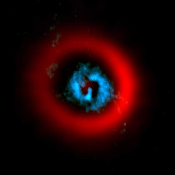Astronomers watch the birth of planets around a young star photo in color 2