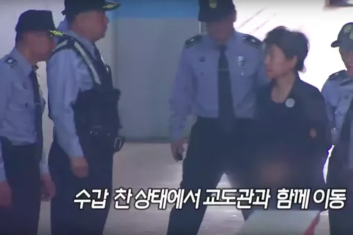 Why the media in Japan France and South Korea blur the handcuffs on the hands of suspects