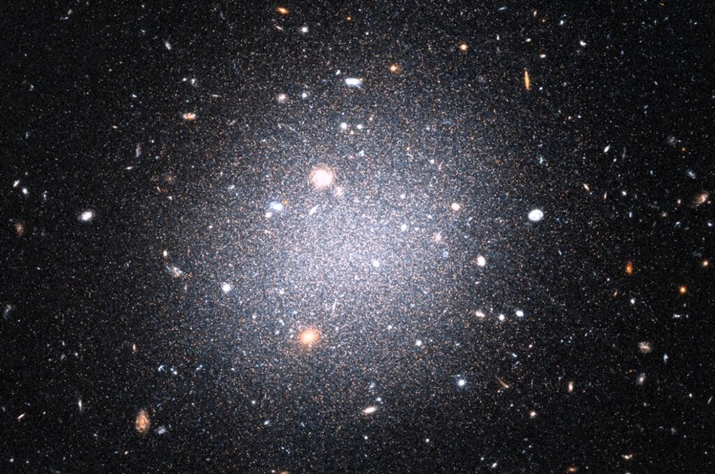 An ancient collision left a chain of galaxies without dark matter 1