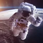 Astronauts on spacewalk suspended on ISS