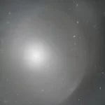 Hubble peers through the mysterious shells of this giant elliptical galaxy 1