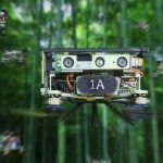 Incredible footage shows a swarm of drones flying through dense forest with astounding accuracy