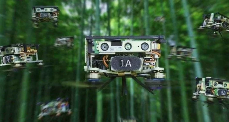 Incredible footage shows a swarm of drones flying through dense forest with astounding accuracy