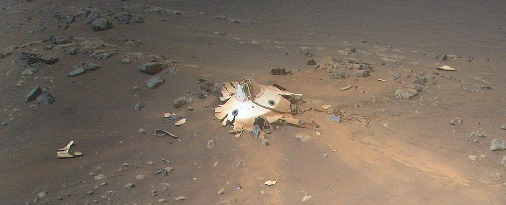Ingenuity travels to see the debris left behind by Perseverances landing on Mars 1