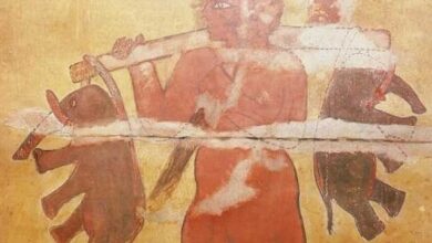 Ancient fresco in the Nubian pyramids depicting a giant carrying two elephants 1