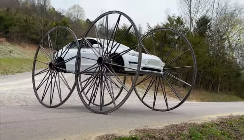 Autoblogger installed stagecoach wheels on Tesla electric car