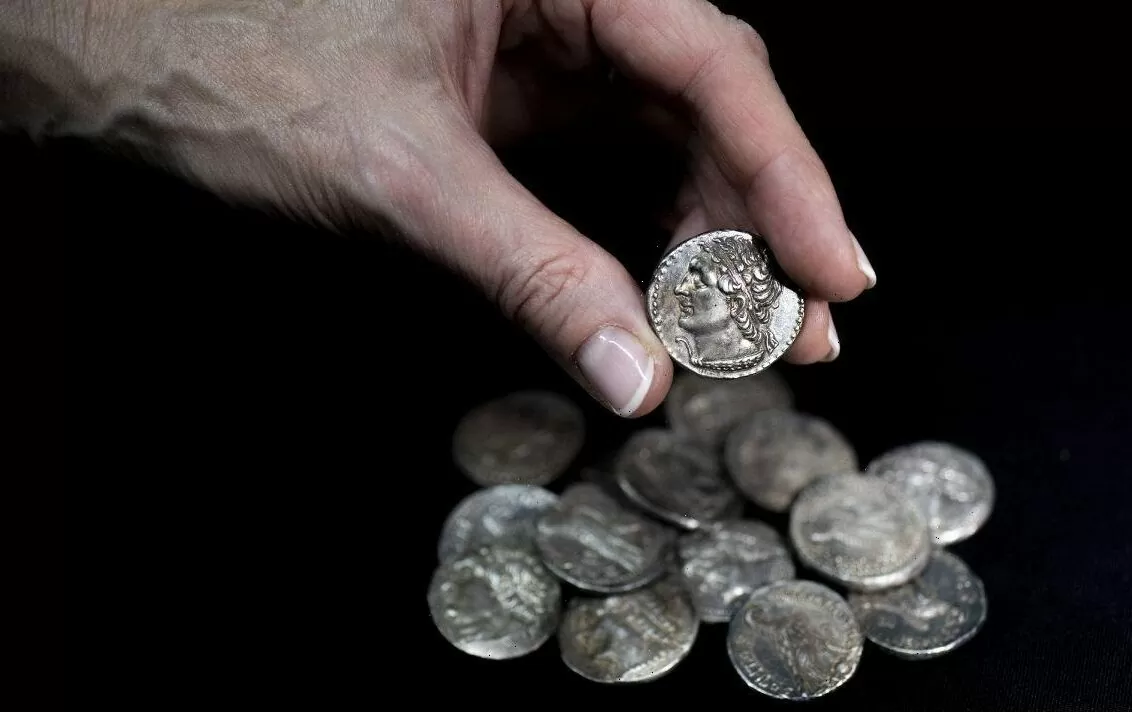 Archaeologists have found silver coins that are more than 2000 years old