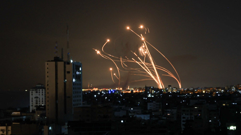 Hamas launches massive rocket barrage as Israel delays invasion