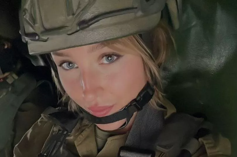 Amidst war, Israel's 'Queen of Guns' resumes posting racy content, asserting that 'life goes on' (1)